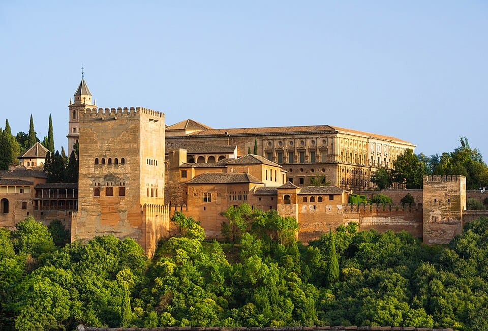 The Alhambra's towers and palaces above the trees, Granada, Spain