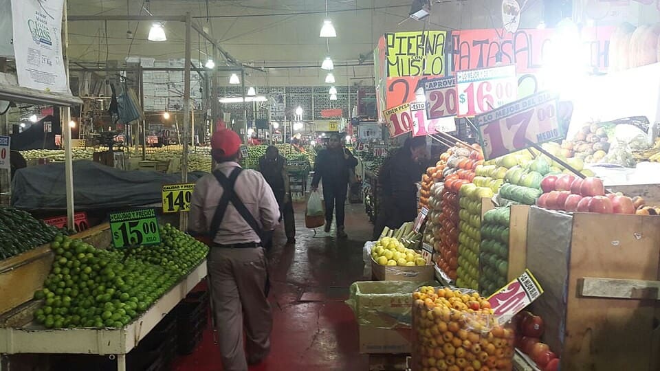 Fruit and vegetable stalls inside the Mercado de la Merced, Mexico City