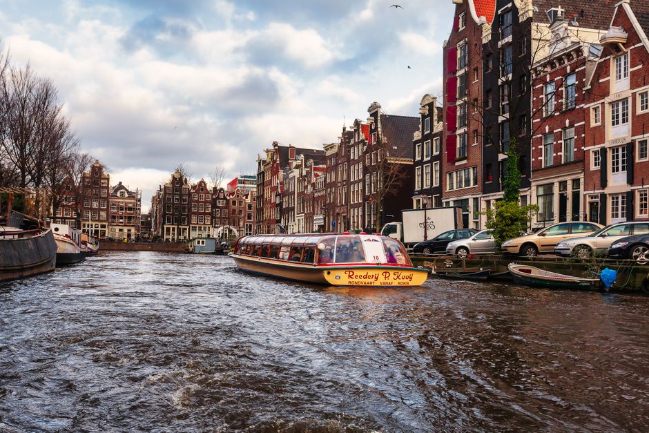 Take a boat through the canal ring, Amsterdam, Netherlands