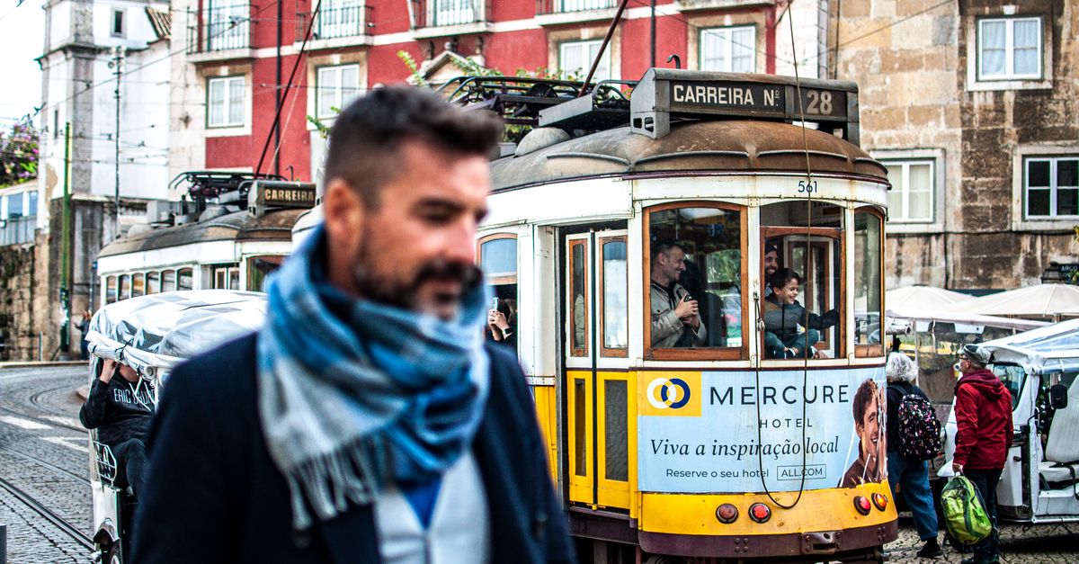 Ride Tram 28 through the old city, Lisbon, Portugal