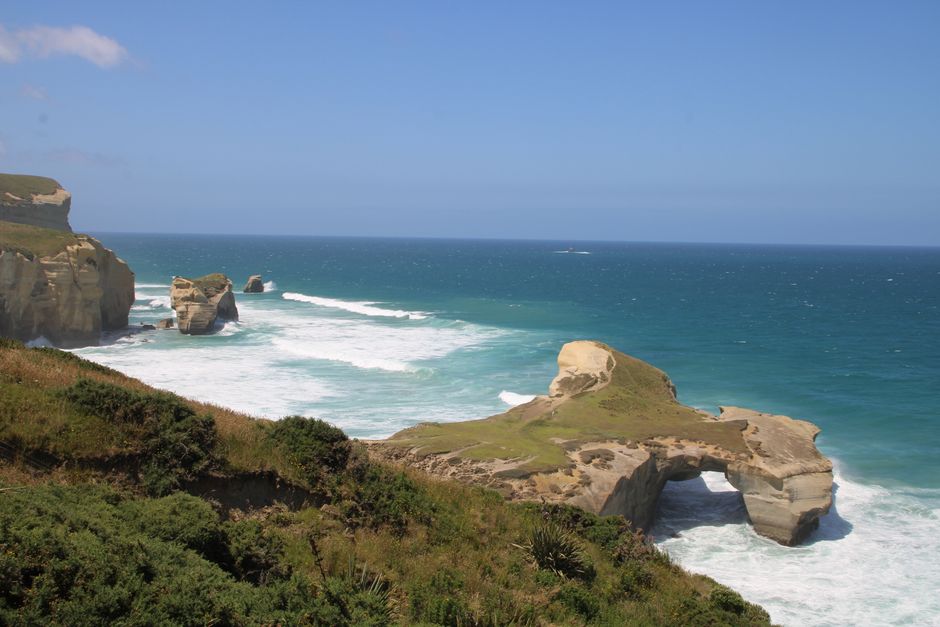 Walk down through the sandstone at Tunnel Beach, Dunedin, New Zealand